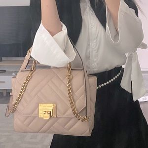 Michael Kors Pink quilted leather bag with gold chains